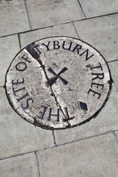 Plaque in London (located near Marble Arch) remembering the site of the Tyburn Tree.  This was the site of Tyburn gallows where prisoners were hung from the late 16th century.