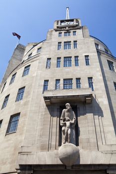 Looking up at the art deco style of BBC Broadcasting House in London.