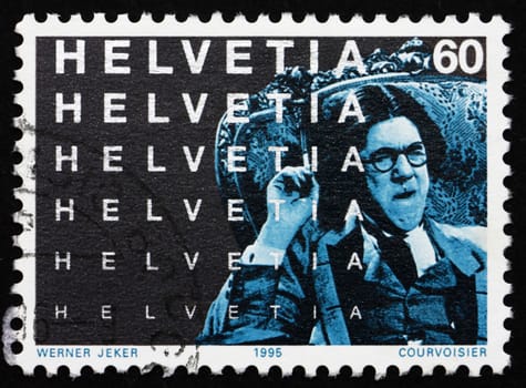 SWITZERLAND - CIRCA 1995: a stamp printed in the Switzerland shows The Vocation of Andre Carrel, Scene from Motion Pictures, Centenary of Motion Pictures, circa 1995