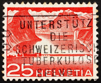SWITZERLAND - CIRCA 1949: a stamp printed in the Switzerland shows Lake Dam, Hydroelectric Power, circa 1949
