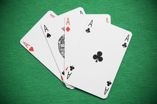 A Colourful Photo of a Hand of Aces 