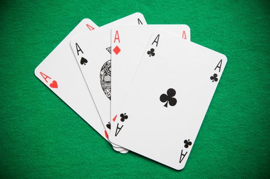 

A Colourful Photo of a Hand of Aces