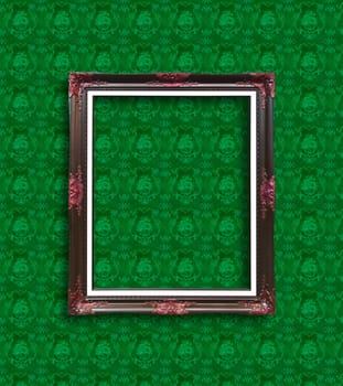 frame on green wallpaper
