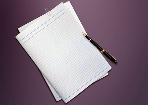 a pen and blank paper on the table