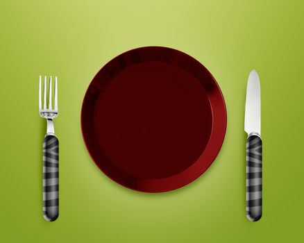 Empty red Plate with knife and fork.