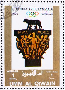 UMM AL-QUWAIN - CIRCA 1972: a stamp printed in the Umm al-Quwain shows Rome 1960, Italy, Olympic Games of the past, circa 1972