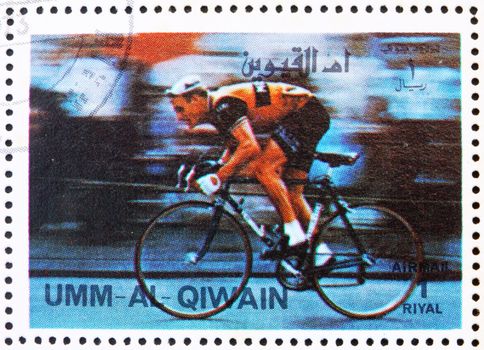 UMM AL-QUWAIN - CIRCA 1972: a stamp printed in the Umm al-Quwain shows Cycling, Olympic Sport, Olympic Games of the past, circa 1972