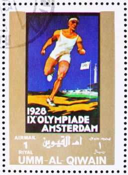 UMM AL-QUWAIN - CIRCA 1972: a stamp printed in the Umm al-Quwain shows Amsterdam 1928, Netherlands, Olympic Games of the past, circa 1972