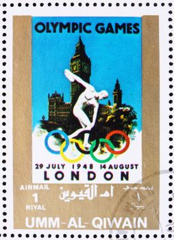 UMM AL-QUWAIN - CIRCA 1972: a stamp printed in the Umm al-Quwain shows London 1948, Great Britain, Olympic Games of the past, circa 1972