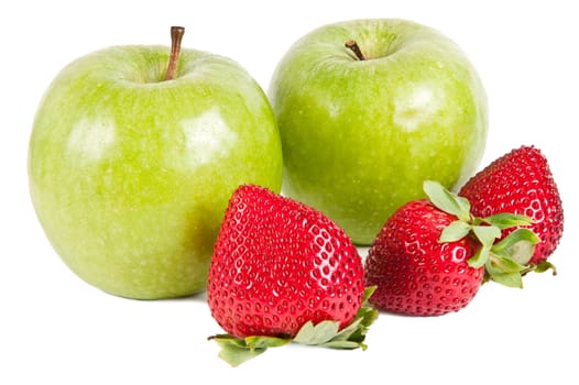 Three strawberries in front of two green apples