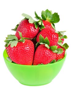 Green bowl of red strawberries