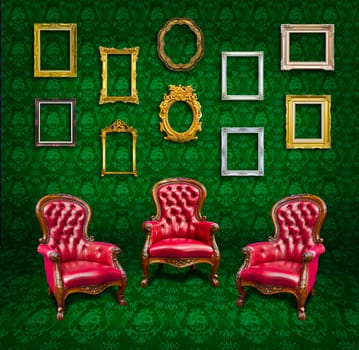 vintage luxury armchair and frame in green wallpaper room