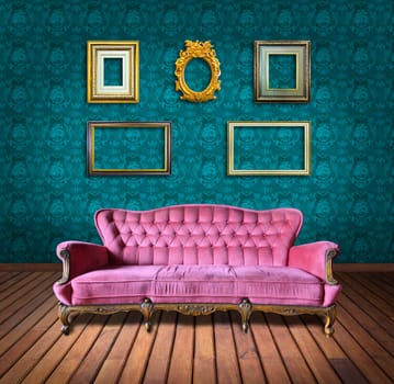vintage luxury armchair and frame in green wallpaper room