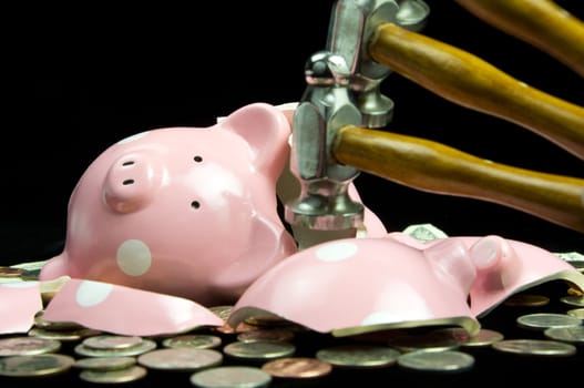 Broken piggy bank with cash & coins