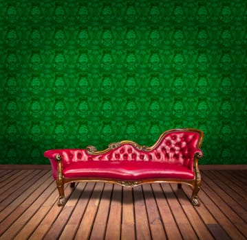 Sofa in green wallpaper room