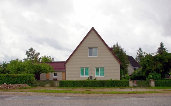 The wooden house on a background of the  sky