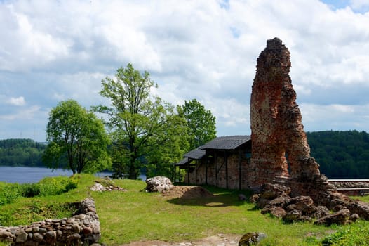  Estonia.Viljandi. Ruins of a castle and clouds 