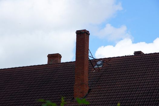 the roof and chimney with blue sky