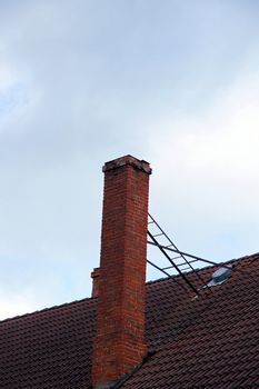 the roof and chimney with blue sky