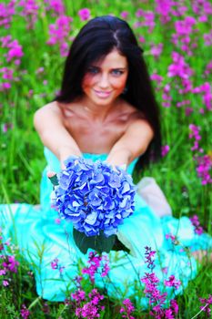 woman on summer flower field