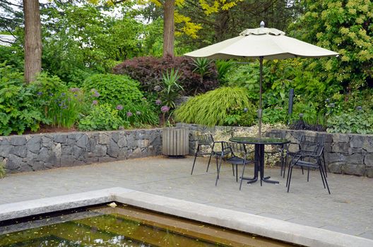 Botanical garden patio with table and chairs