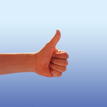 men's hand make thumbs up on blue sky