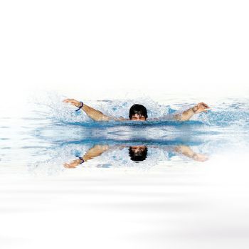 man swims in swimming pool