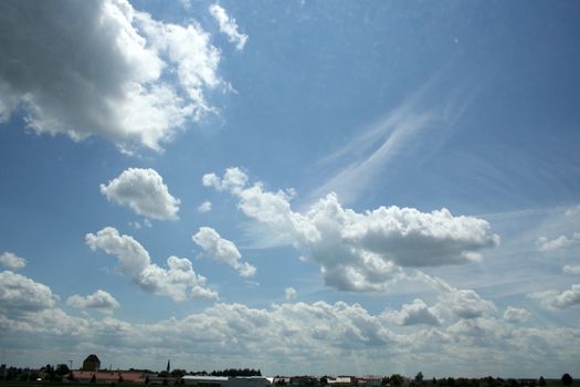 white clouds on blue sky