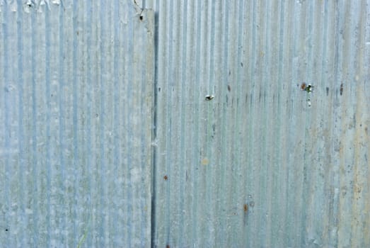 A rusty corrugated iron metal texture.