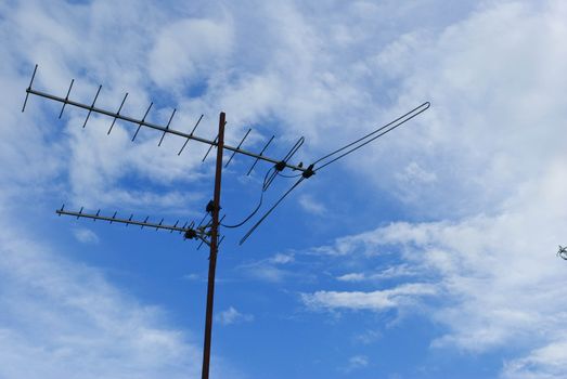 Home advance TV antenna on blue sky