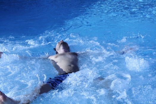 young attractive man relax in spa area