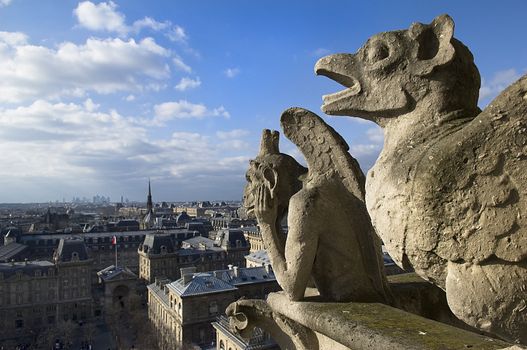 stone guards - chimere of Notre-Dame overlooking Paris. Notre Dame de Paris, Paris, Europe