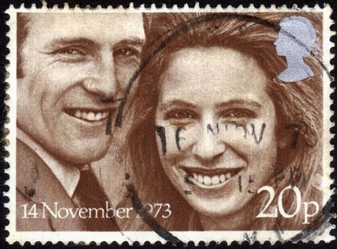 United Kingdom-CIRCA 1973: stamp printed in the United Kingdom, shows images of Princess Anne & Captain Mark Phillips,   dedicated  to Royal Wedding  ,November 14, 1973 Windsor, circa 1973
