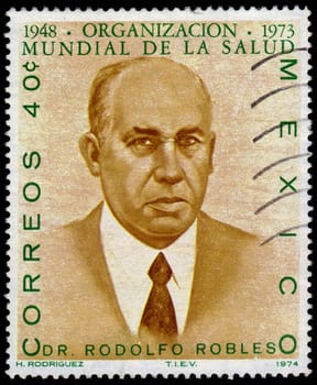 Mexico-CIRCA 1974: stamp printed in Mexico, shows a portrait of dr. Valverde Rodolfo Robles (1878-1939) was born in Guantemala, professor of anatomy. devoted to 25 anniversary of the World health organization, circa 1974;