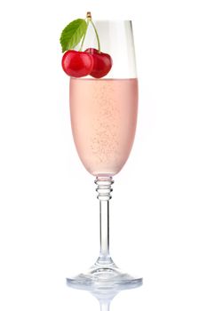 Glass of pink champagne with fresh cherry berries isolated on white background