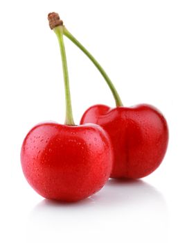 Ripe wet cherry berries isolated on white background 
