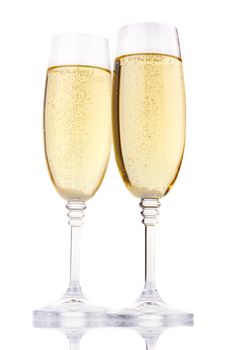 Two glasses of champagne isolated on white background 