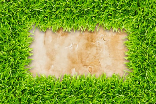 green grass frame on vintage paper background