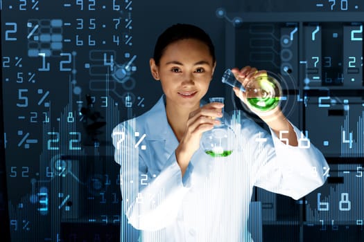 Young scientist in laboratory in white uniform