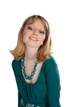 beauty portrait of a blonde in a green dress isolated on white background