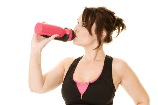 woman drinking froma sports bottle during a workout isolated on white
