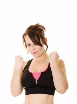 woman holding fists up during a workout isolated on white