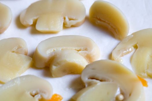 Stock photo: an image of a background of mushrooms on dough