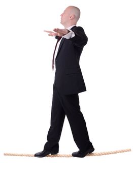 businessman walking the line isolated on white background