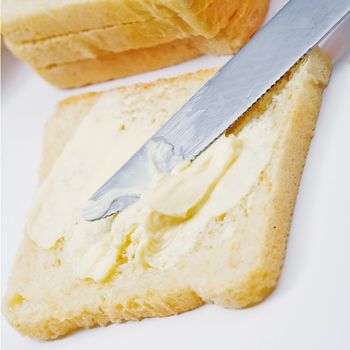 Stock photo: food theme: an image of yellow butter on bread
