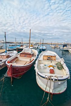 View of fishing boats in port on the island of Capri.