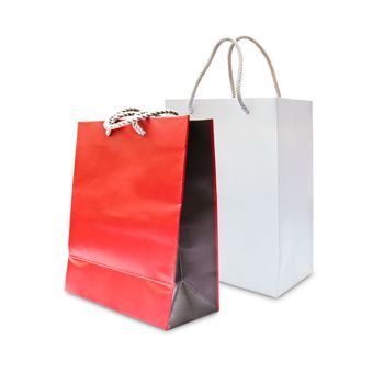 red and white paper shopping bag isolated