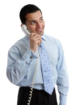 A happy businessman looking up and smiling.