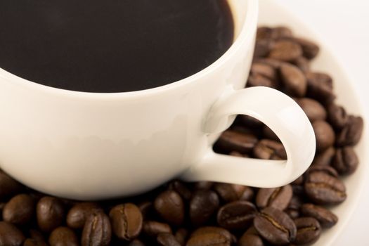 cup of coffee and coffee beans