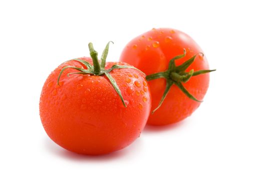 two tomatoes isolated